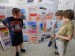 22 Second and third grade poster presentation in the hall